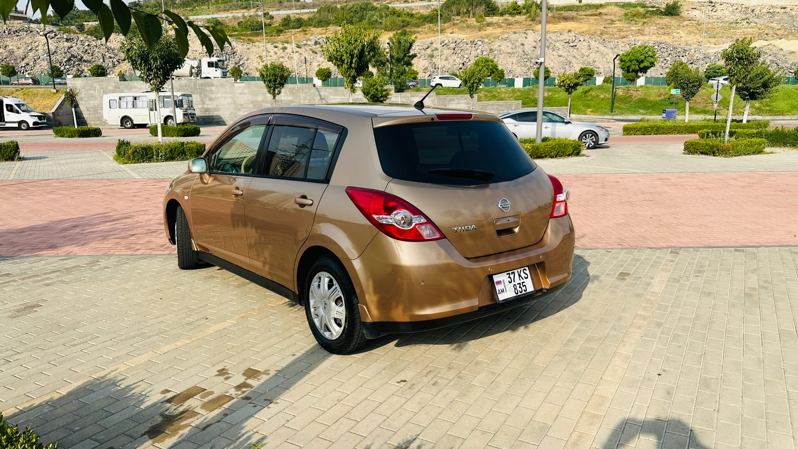 Nissan Tiida — фото 4