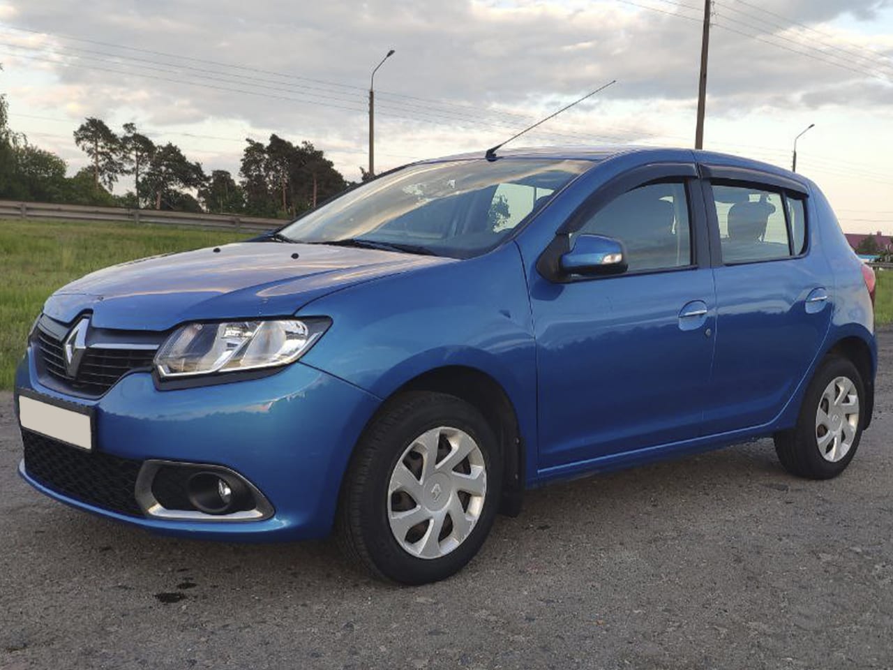 Renault Sandero 2015 — фото 2