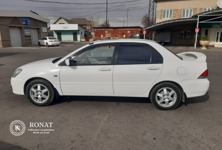 Mitsubishi Lancer — фото 3